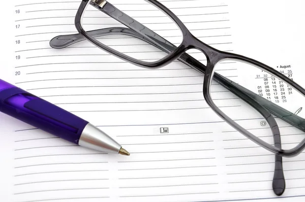 Pen and glasses — Stock Photo, Image