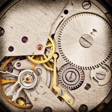 Mechanical clockwork. Close up shot. clipart