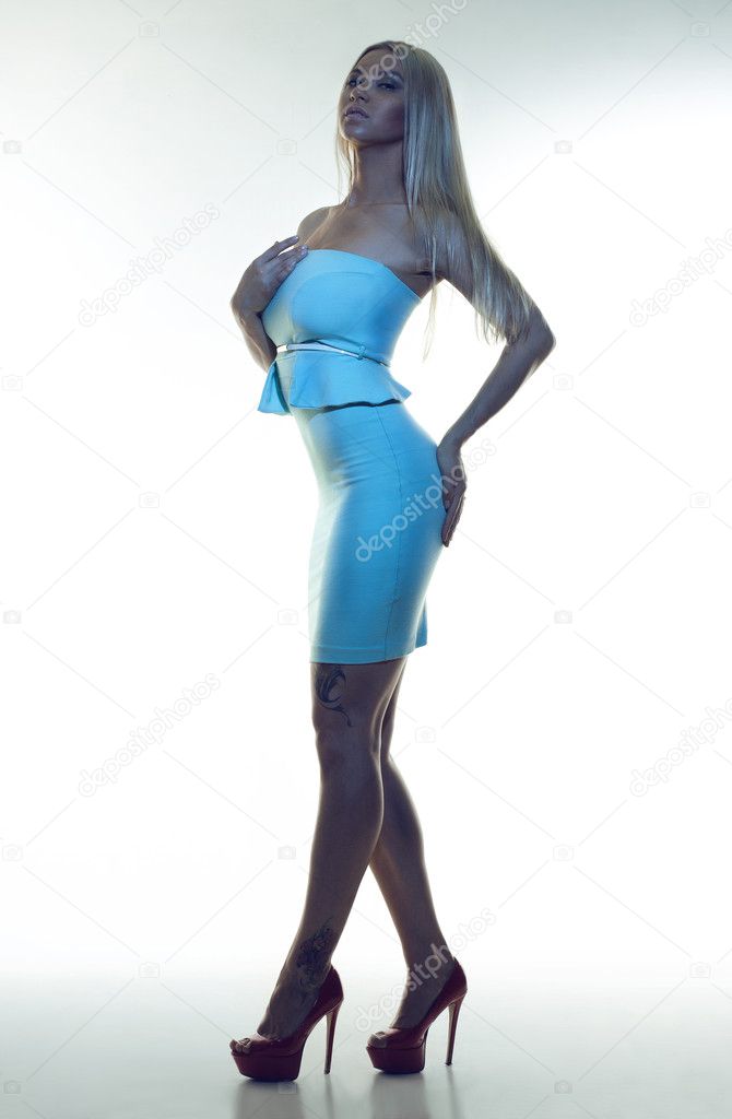 Luxury woman in blue dress