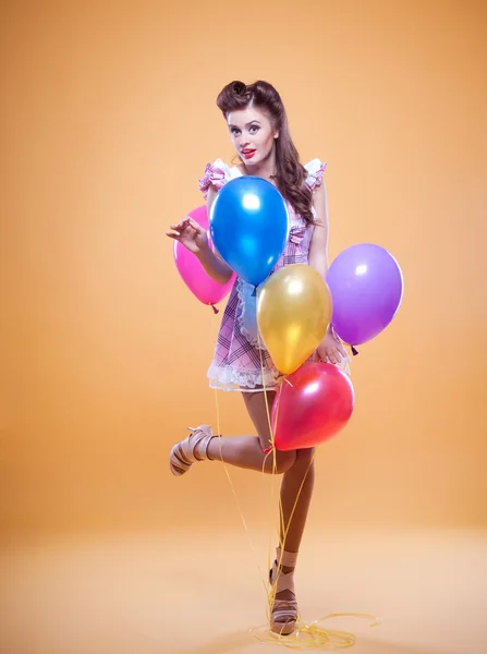 Beautiful pin up with balloons Stock Photo