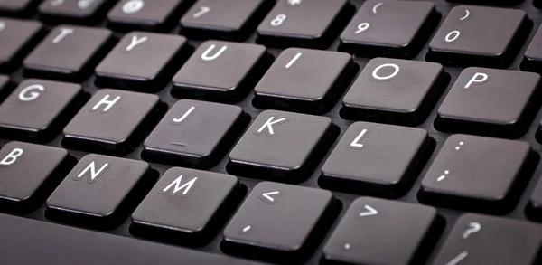 Клавиатура с черными кнопками — стоковое фото