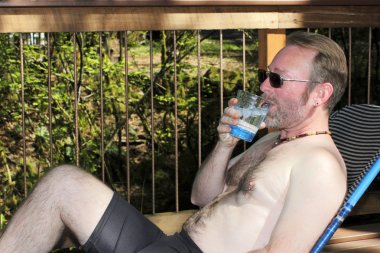 Shirtless Man Drinking Water clipart