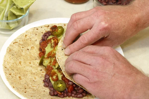 Rolling a Vegetarian Wrap — Stock Photo, Image