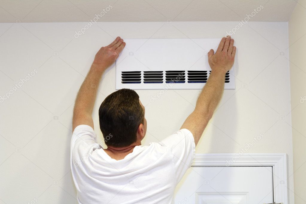 Man Covering Air Vent
