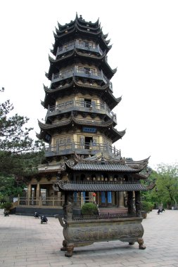 High pagoda in buddhist temple clipart