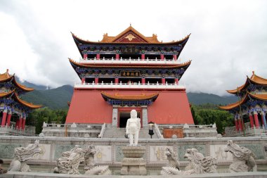 Buddha and dragons near temple clipart