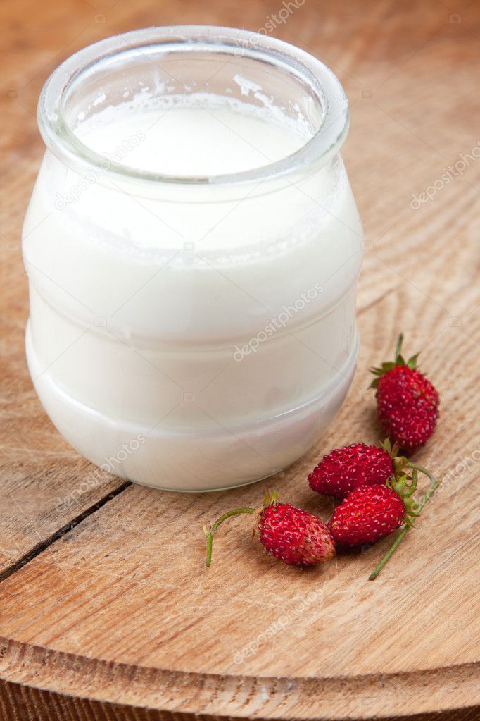 Natural yoghurt in a glass pot