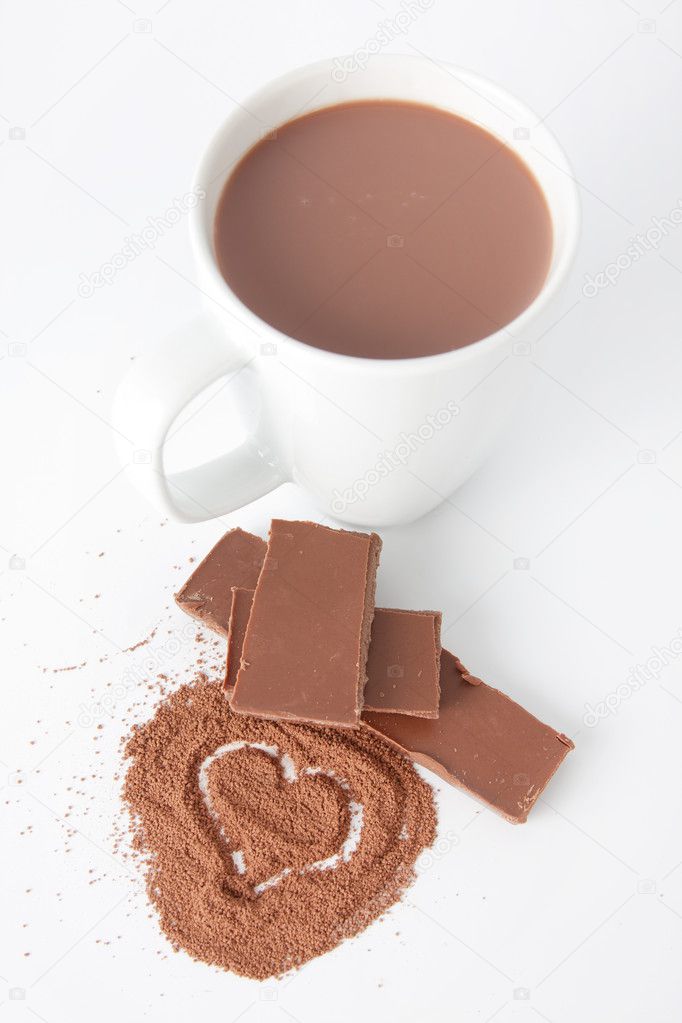 Cup of hot chocolate and cocoa powder