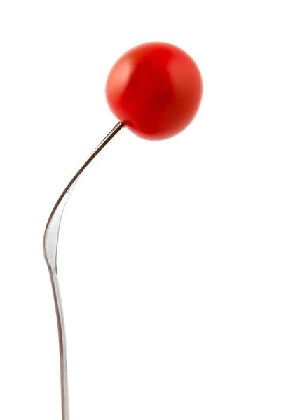Juicy cherry tomato on a fork — Stock Photo, Image
