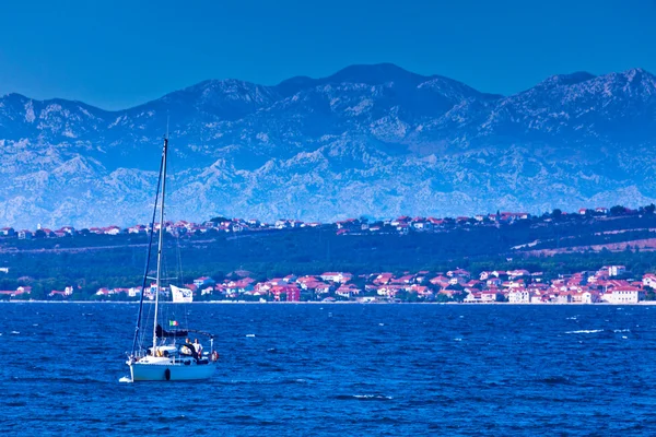 stock image Sea, mountains, boat and city