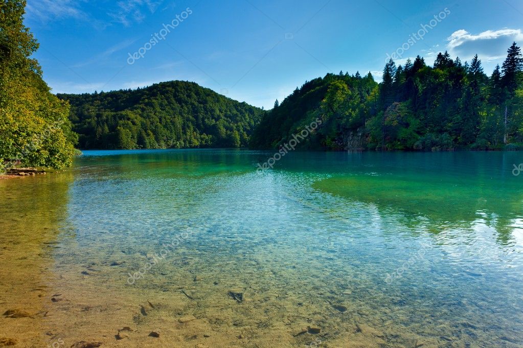 Waterfall and lake Stock Photo by ©Mironovfoto 11046411