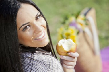 Girl with an apple clipart