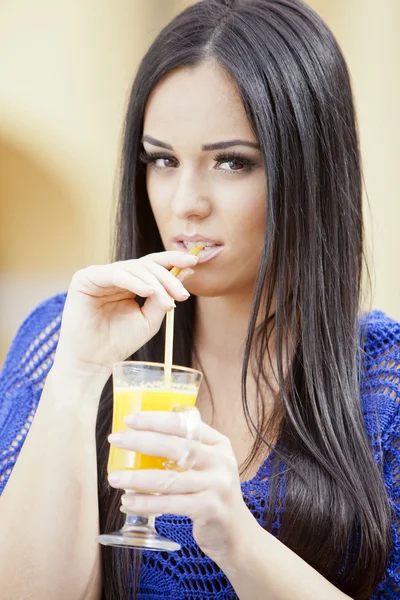 Girl drinking juice — Stock Photo, Image