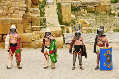 Gladiators fight in Roman Amphitheater of Tarragona, Spain clipart