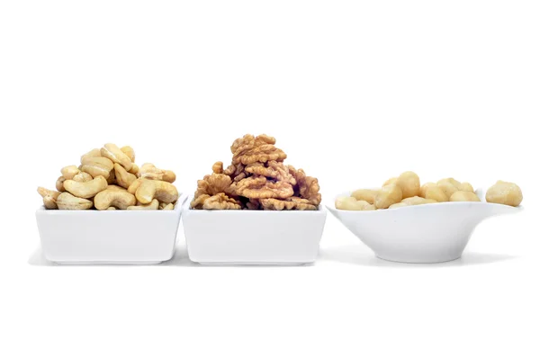 Bowls with different nuts — Stock Photo, Image