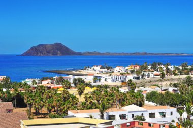 Lobos Island and Corralejo in Fuerteventura, Spain clipart