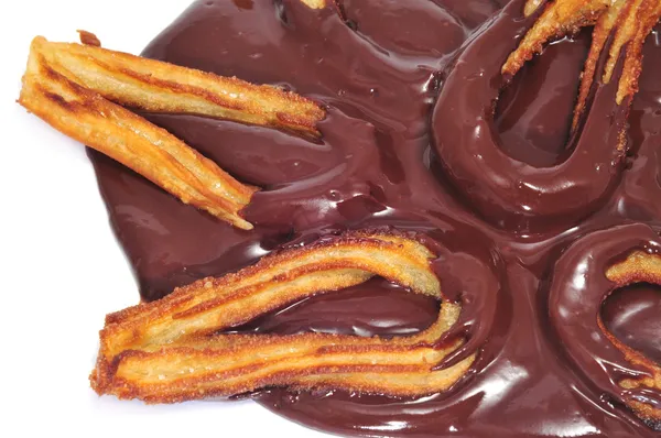 Churros con chocolate, une collation sucrée espagnole typique — Photo