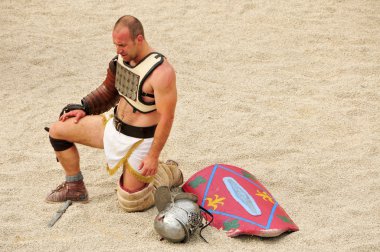 Gladiator on the arena of Roman Amphitheater of Tarragona, Spain clipart