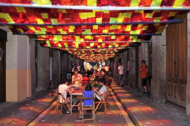 Fraternitat Street garnished during Festes de Gracia 2012 in Bar clipart