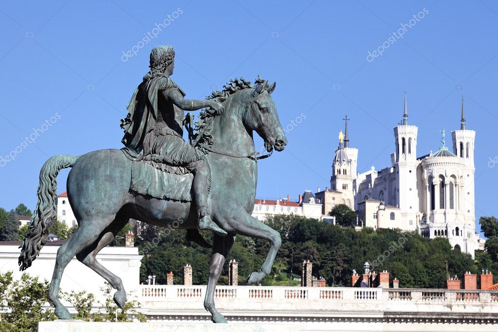 Famous statue of Louis XIV and Basilique Fourviere