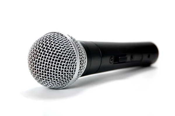 Svart mikrofon på vit bakgrund — Stockfoto