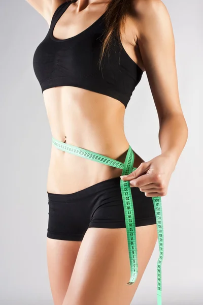 Nő, mérési tökéletes test, egészséges életmód fogalma Stock Kép