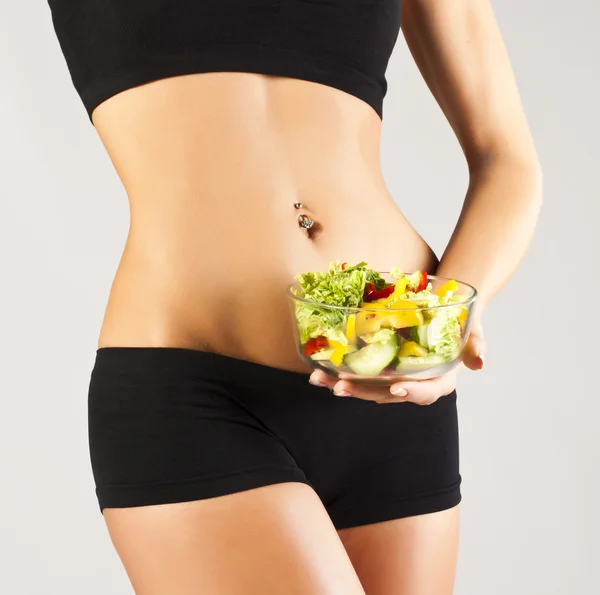 Sports pres young girl. Salad — Stock Photo, Image
