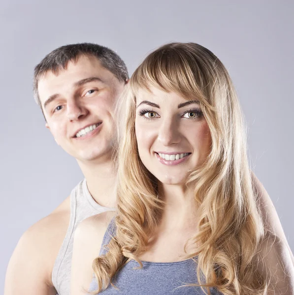 Portrait of a happy young couple. Studio — Stock Photo, Image