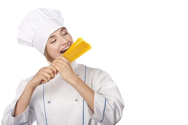 Young chef in the studio. White background — Stock Photo, Image