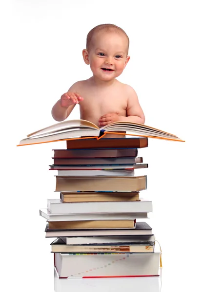 Portrait of a little boy with a stack of books — Stock Photo, Image