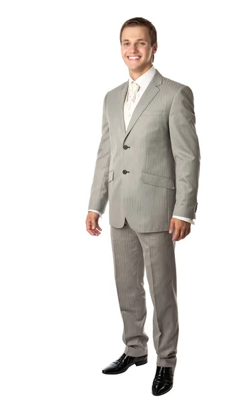 Full length of a young man in a suit smiling brightly — Stock Photo, Image