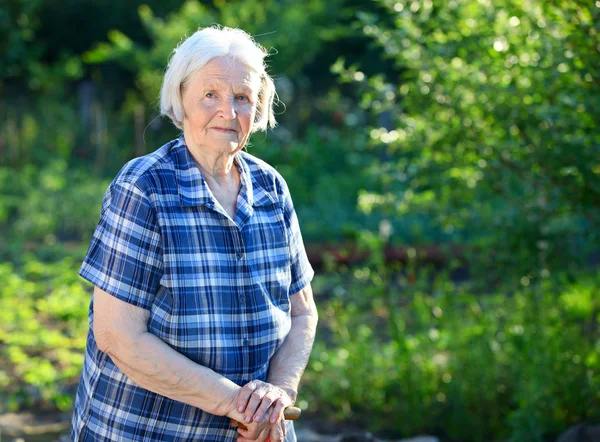 Portrait of an elderly woman outdoors — Stock Photo, Image