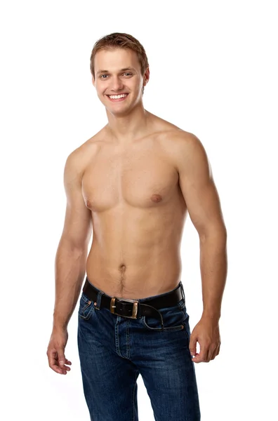 Joyeux jeune homme en jeans avec torse nu — Photo