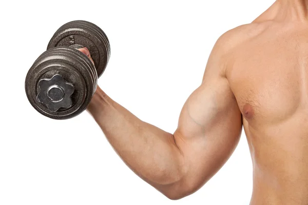 Cropped view of a muscular man lifting a dumbbell over white — Stock Photo, Image