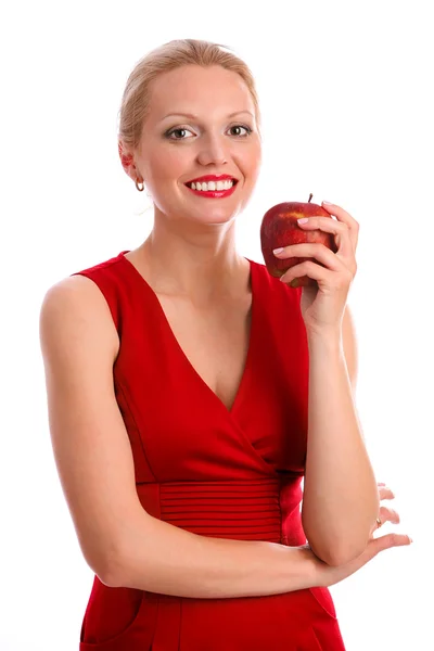 Magnifique jeune femme tenant une pomme rouge — Photo