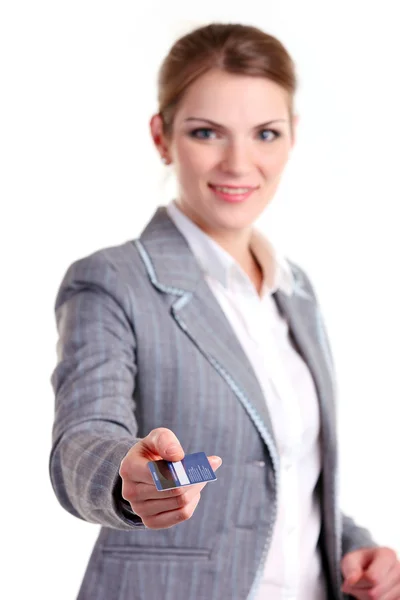 Young business woman stretching out hand with plastic card — Stock Photo, Image