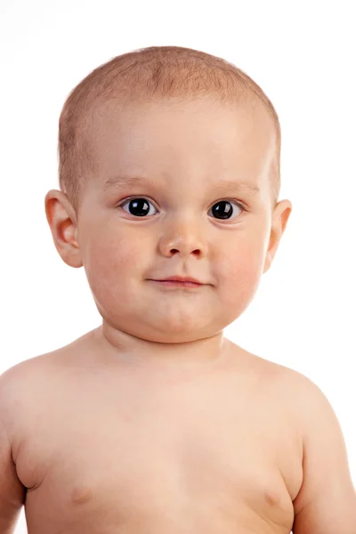 Portrét smějící se jedna - letého chlapce nad bílým pozadím — Stock fotografie