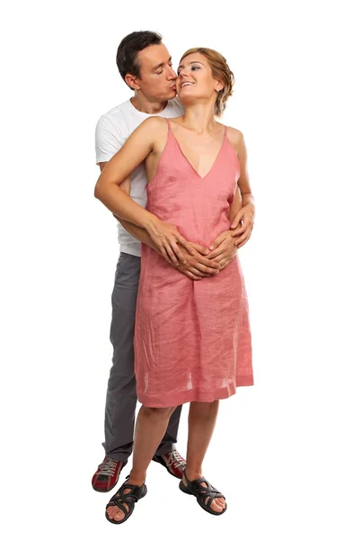 Full length of a young Caucasian couple over white background — Stockfoto
