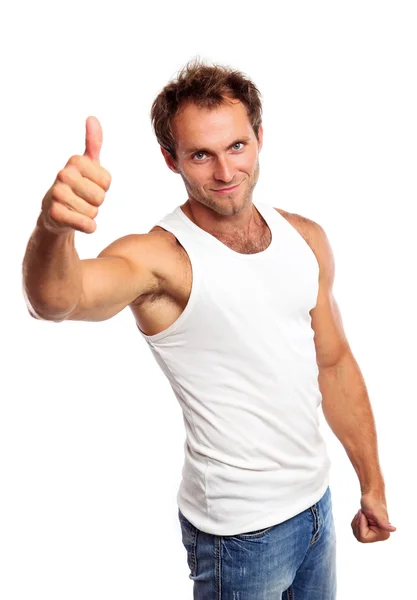 Porträtt av en ung muskulös man, tummen upp — Stockfoto