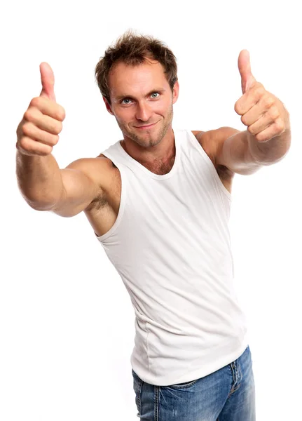 Portrait of a muscular young man, thumbs up — Stock Photo, Image