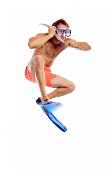 Caucasian swimmer wearing mask, snorkel and flippers jumping — Stock Photo, Image