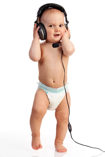 Portrait of a cute one-year old boy wearing a headset Stock Photo