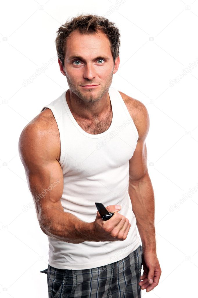 Young Caucasian man with knife, isolated on white background