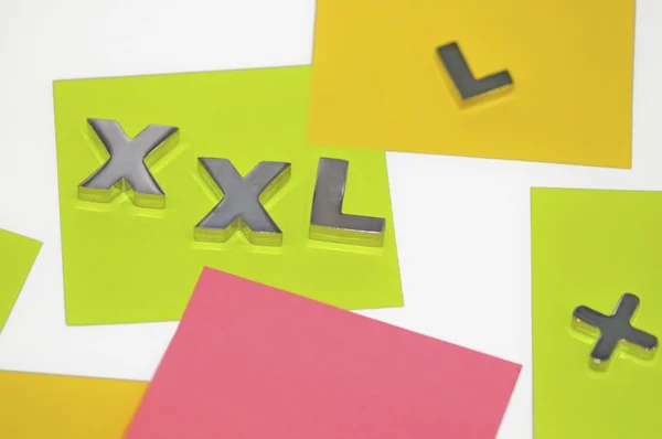 stock image Xxl sign, colored labels