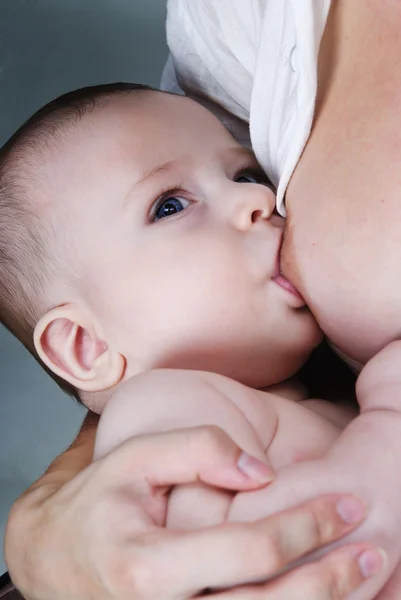 stock image Mother breastfeeding her baby.