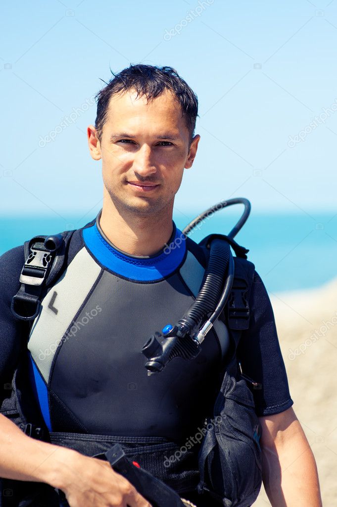 Young man in a diving suit — Stock Photo © katalinks 11820078