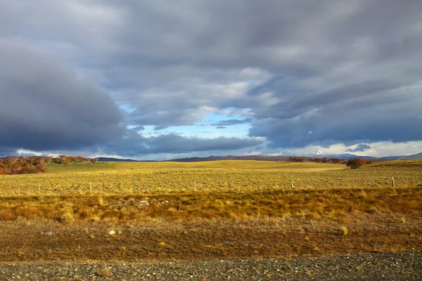 Stock image Official building in Punta Arenas with the Strait of Magellan