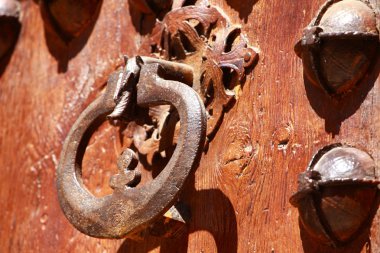 Ancient wood brown door lock clipart