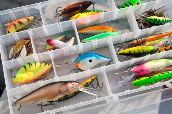 A Large Fisherman`s Tackle Box Fully Stocked with Lures and Gear for Fishing .fishing Lures and Accessories in the Box Background Stock Photo - Image of  bass, line: 227685752