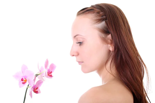 Mladá zdravá zrzavý žena s růžovou orchidej — Stock fotografie